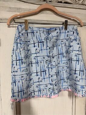 Lilly Pulitzer LuxleticLight flamingos golfing with Pink Ruffle skort